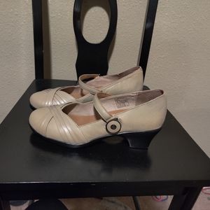 Beige wedge style shoes